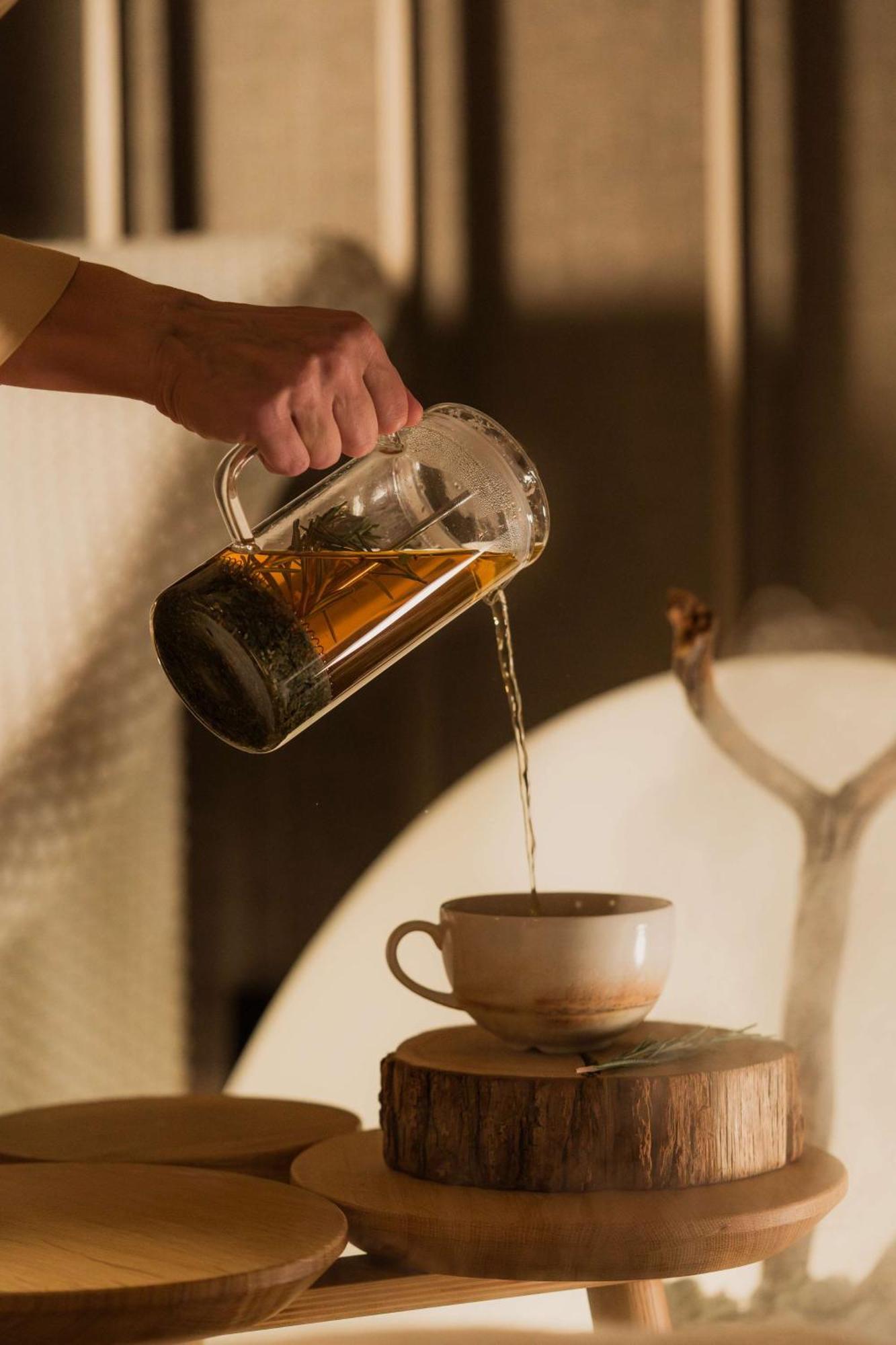 Nh Collection Helsinki Grand Hansa Exteriér fotografie A tea being poured